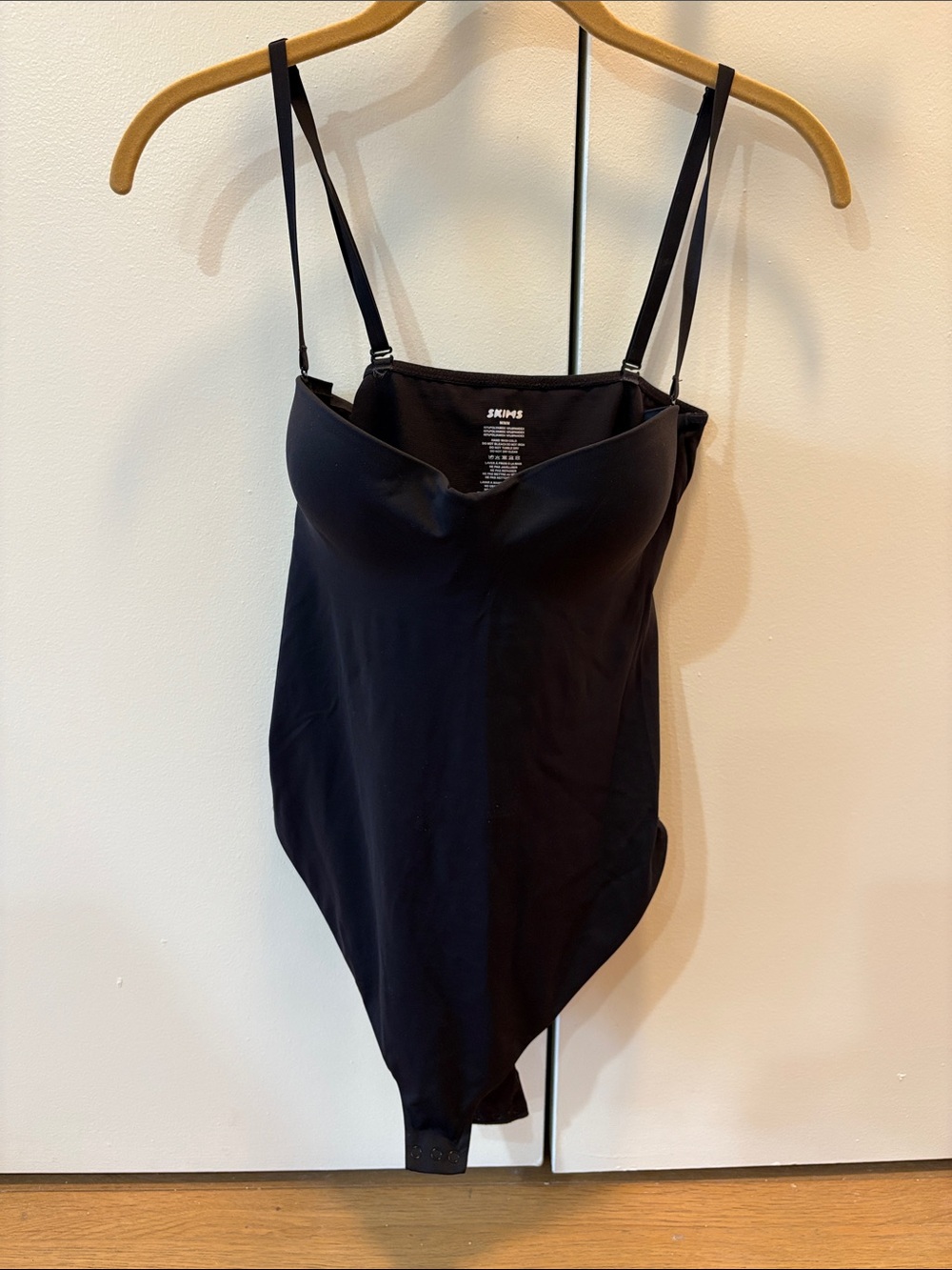 SKIMS Black Sculpting Bodysuit with Adjustable Spaghetti Straps